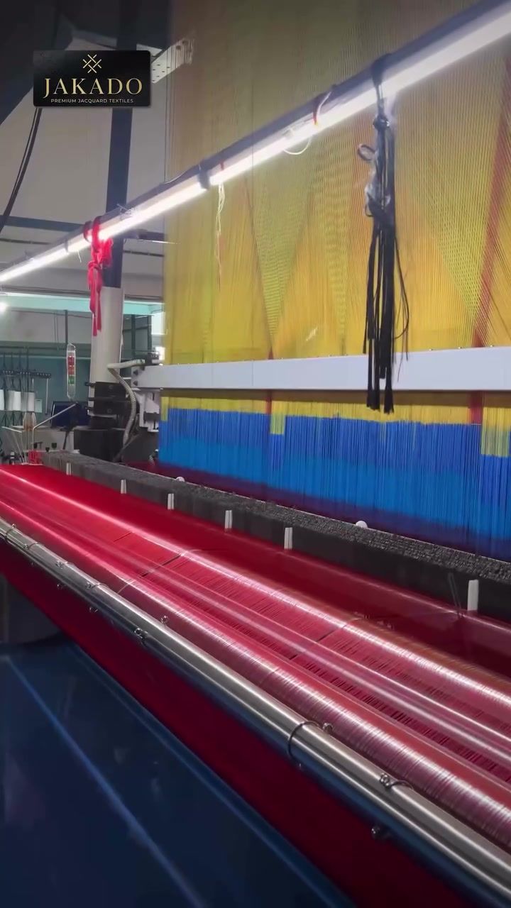 Jacquard looms weaving sarees at the Jakado factory